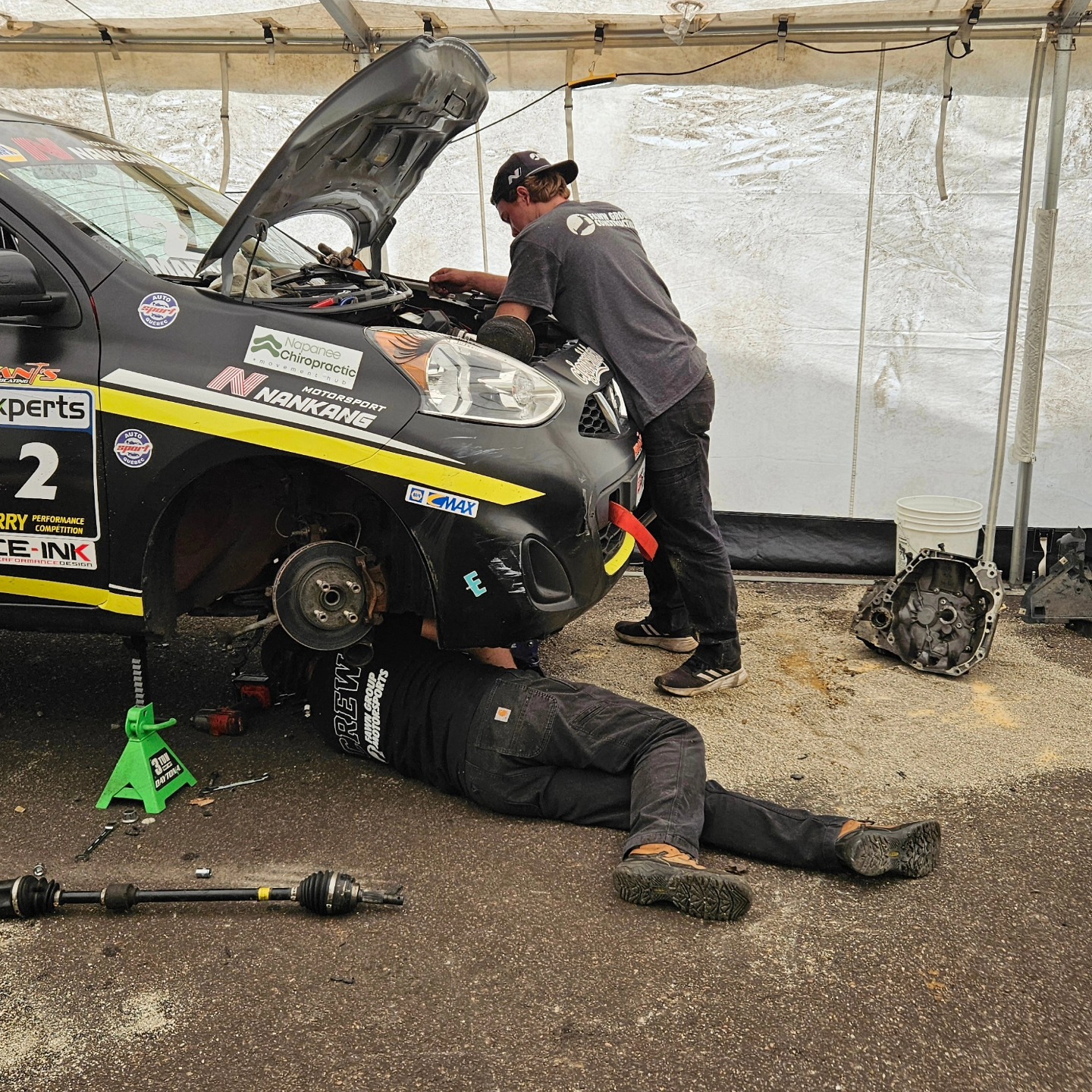 Working on vehicle mechanics in the garage